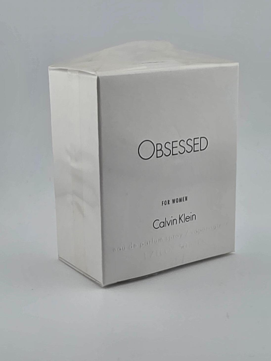 Vintage Calvin Klein Obsessed Eau de Parfum Spray für Damen, weiße Verpackung.